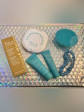 Tula Skincare gold glow eye balm full size plus gifts. Mirror, face scrubber kit